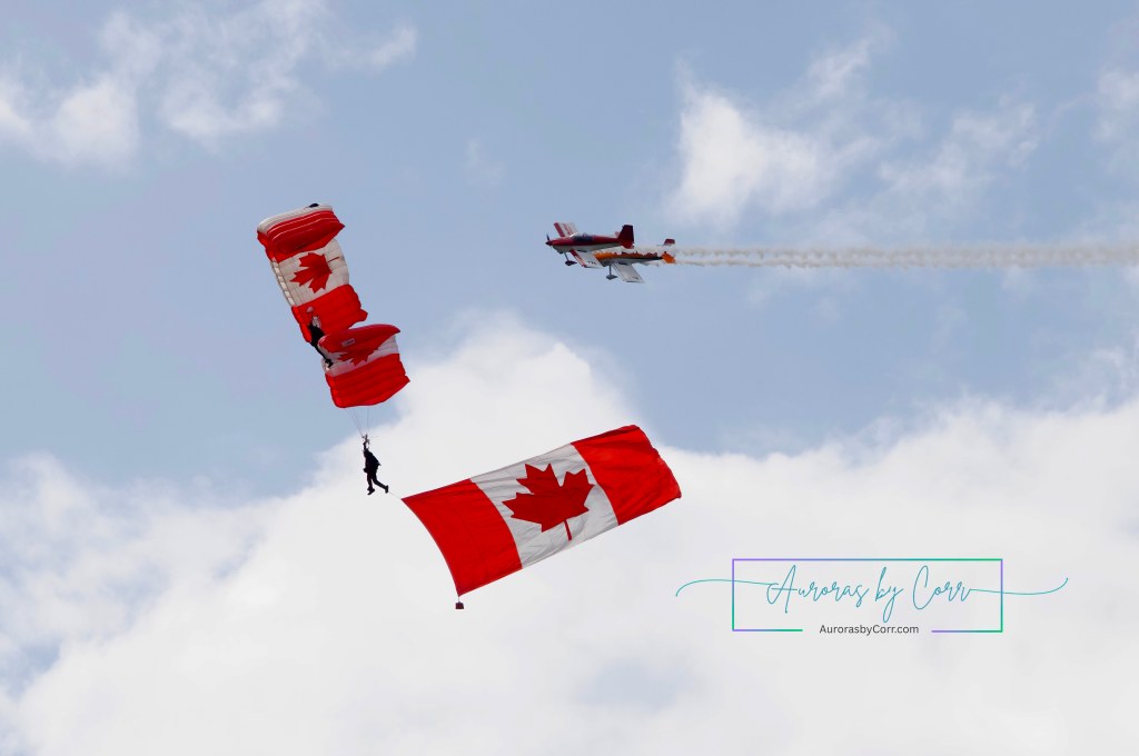 Canadian Armed Forces Parachute Team, the SkyHawks, with Undaunted Airshows sharing their airspace at the Cold Lake Air Show 2026