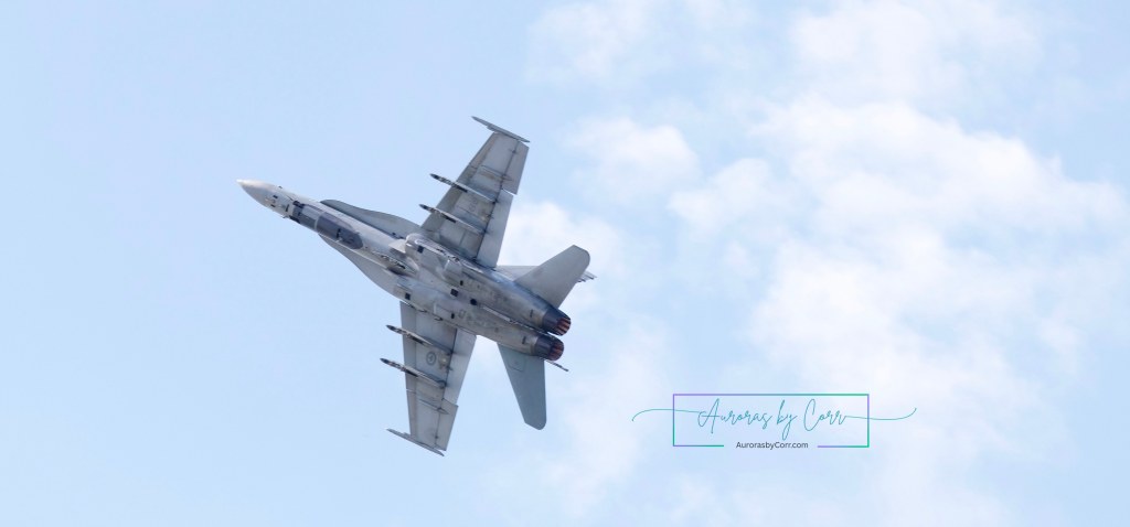 The underbelly of a CF-18 Hornet as it maneuvers during the Cold Lae Air Show 2026