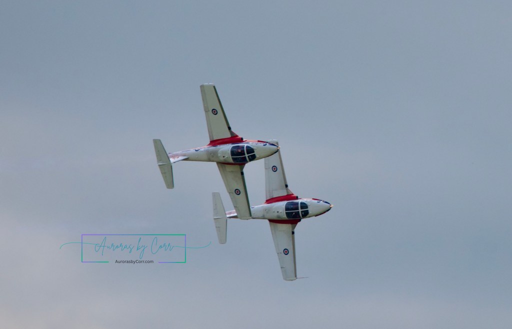 Two RCAF solo planes fly in tandem mid air at the Cold Lake Air Show 2026