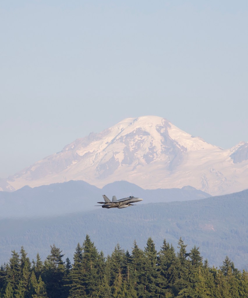 A lone CF-18 Hornet takes to the sky against the beautiful Mount Baker backdrop at the 2026 Abbotsford Air Show